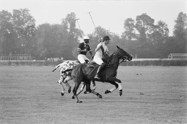 Prince Charles playing a polo match in Deauville in 1977.