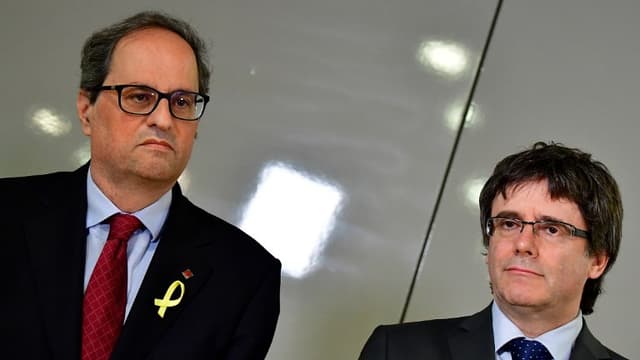 Le nouveau président de la Catalogne, Quim Torra et Carles Puigdemont à Berlin le 15 mai 2018.