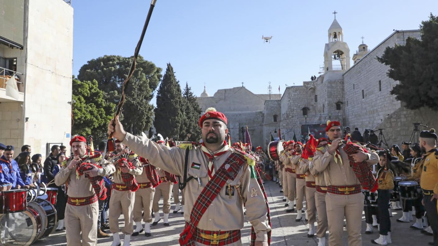 Les scouts palestiniens, à Bethléem, le 24 décembre 2019. Les scouts palestiniens, à Bethléem, le 24 décembre 2019.