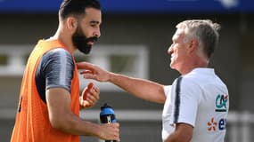 Adil Rami et Didier Deschamps