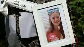 Une photo de Lina est fixée sur un arbre près de l'endroit où la jeune fille a disparu en septembre 2023, le 30 juillet 2024 à Saint-Blaise-la-Roche, dans le Bas-Rhin