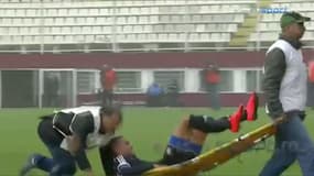 Un soigneur roumain fait  chuter un joueur blessé