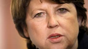Redoutant une très forte abstention, le premier secrétaire du Parti socialiste, Martine Aubry, a accusé mercredi l'UMP d'occulter volontairement les cantonales par peur de la sanction électorale. /Photo prise le 9 mars 2011/REUTERS/Robert Pratta