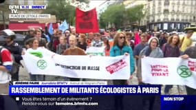 Après une traversée de Paris à vélo, les militants d'Extinction Rebellion poursuivent leur manifestation place de l'Étoile
