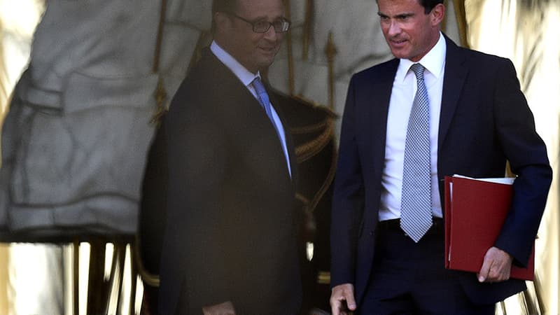 Manuel Valls et François Hollande à la sortie de l'Elysée ce mardi 26 août.