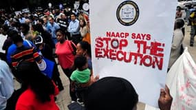 Manifestation de protestation contre l'exécution de Troy Davis, à Atlanta, aux Etats-Unis. Cet Afro-Américain de 42 ans devrait être exécuté mercredi par injection létale, la justice de l'Etat de Géorgie ayant refusé de le gracier. Sept des neuf témoins d