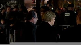 Attentats: Angela Merkel rend hommage aux victimes place de la République