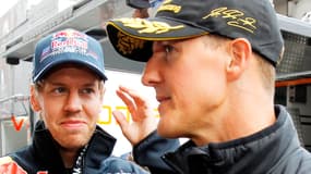 Sebastian Vettel (à g.) et l'idole de sa jeunesse, Michael Schumacher.