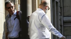 Thierry Moser (gauche), avocat des parents de Grégory et Stephane Giuranna (droite), avocat de Marcel Jacob au Tribunal de grande instance de Dijon, le 20 juin 2017.