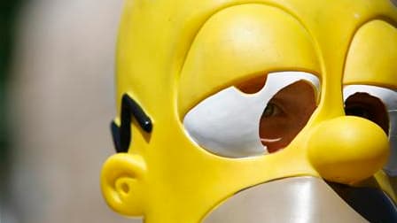 Homer Simpson et son fils Bart sont catholiques, peut-on lire dans un article du très sérieux quotidien officiel du Vatican, l'Osservatore Romano, qui invite les parents à laisser leurs enfants suivre les aventures des "petits bonshommes jaunes". /Photo d