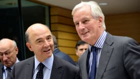 Pierre Moscovici et Michel Barnier, le 18 décembre 2013.