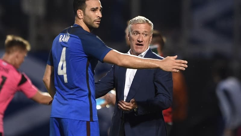 Adil Rami et Didier Deschamps