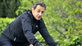 Nicolas Sarkozy à vélo en 2012. 