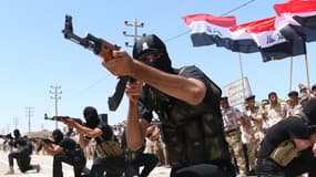 Des combattants sunnites engagés contre les partisans de l'Etat islamique en Irak, le 7 août 2014.