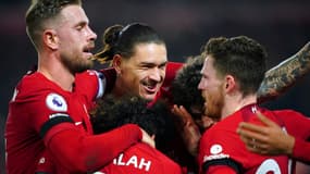 J. Henderson, D. Nuñez, M. Salah et A. Roberston