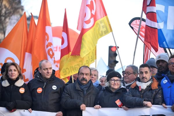 Laurent Berger et Philippe Martinez, Frédéric Souillot à la manifestation contre la réforme des retraites, à Paris, le 7 février 2023. 