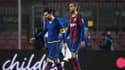 Lionel Messi et Oscar Mingueza tête basse après la défaite du Barça contre le PSG