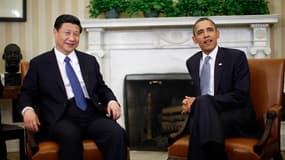 Barack Obama et le vice-président chinois Xi Jinping, qui devrait prendre les rênes du régime communiste en fin d'année, à la Maison blanche, à Washington. Le président américain a souligné mardi qu'il était vital pour les Etats-Unis d'avoir des relations