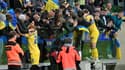 Les joueurs de l'Ukraine célébrant leur qualification pour l'Euro 2024, le 26 mars 2024