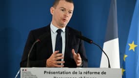Le ministre du Travail Olivier Dussopt, lors d'une conéfrence de presse à Paris, le 21 novembre 2022