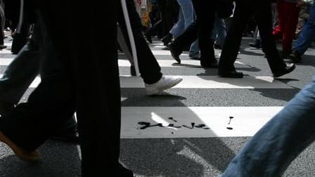 Le Front de gauche a récolté samedi près de 6.000 euros pour les salariés en grève contre la réforme des retraites. /Photo d'archives/REUTERS