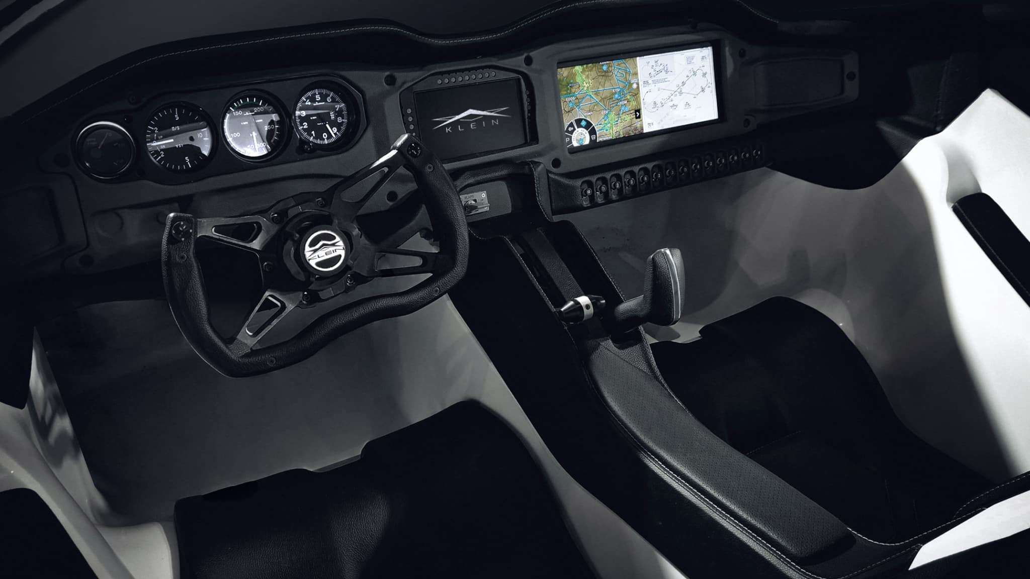 La transformation automatique, commandée par un seul bouton, de la voiture en avion ne demande que trois minutes La transformation automatique, commandée par un seul bouton, de la voiture en avion ne demande que trois minutes