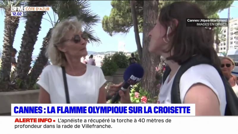 Regarder la vidéo JO 2024: les spectateurs suivent la flamme olympique le long de la Croisette