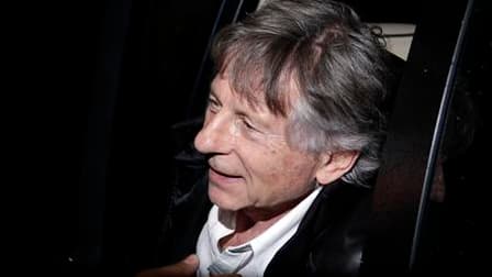 Libre de ses mouvements depuis lundi, le réalisateur franco-polonais Roman Polanski a été photographié samedi près de Montreux, en Suisse, quelques heures avant le concert que devait y donner sa femme, l'actrice et chanteuse Emmanuelle Seigner. /Photo pri