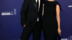 Berenice Bejo et Michel Hazanavicius à leur arrivée au théâtre du Châtelet pour la cérémonie des Cesar, vendredi. La vedette féminine de "The Artist" a été récompensée par le Cesar de la meilleure actrice, tandis que le réalisateur a été doublement honoré