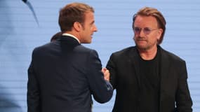 Le chanteur Bono et le président Emmanuel Macon en 2019 à Lyon.
