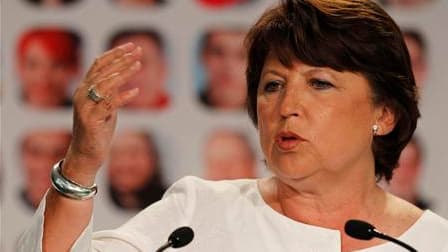 Les prétendants socialistes pour 2012, Martine Aubry et François Hollande en tête, ont rivalisé d'enthousiasme vendredi à l'ouverture de l'université d'été de La Rochelle appelée à donner le ton de la campagne de la primaire. /Photo prise le 26 août 2011/