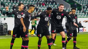 Les Lillois après leur victoire à Wolfsburg.