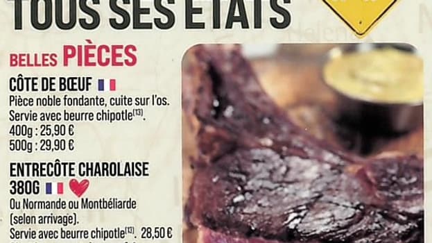 La carte d'un restaurant Buffalo Grill proposant un pavé de bison mariné. La carte d'un restaurant Buffalo Grill proposant un pavé de bison mariné.
