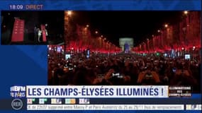 Les Champs-Elysées s'illuminent de rouge pour les fêtes de fin d'année 