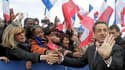 Lors d'un grand meeting sur la place de la Concorde à Paris, Nicolas Sarkozy a annoncé dimanche son intention, s'il est réélu, d'ouvrir en Europe un débat sur le rôle de la Banque centrale européenne pour soutenir la croissance. /Photo prise le 15 avril 2