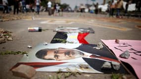 Dans les rues du Caire. Le président égyptien par intérim Adli Mansour a mené samedi des consultations au palais d'Itihadiya pour former un nouveau gouvernement et tenter de sortir le pays de la crise, au lendemain d'affrontements qui ont fait une trentai