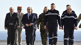 François Hollande à bord du Charles-de-Gaulle, le 14 janvier, a annoncé la mise en place de nouveaux financements pour la Défense