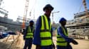Des travailleurs sur le chantier d'un stade au Qatar en décembre 2019