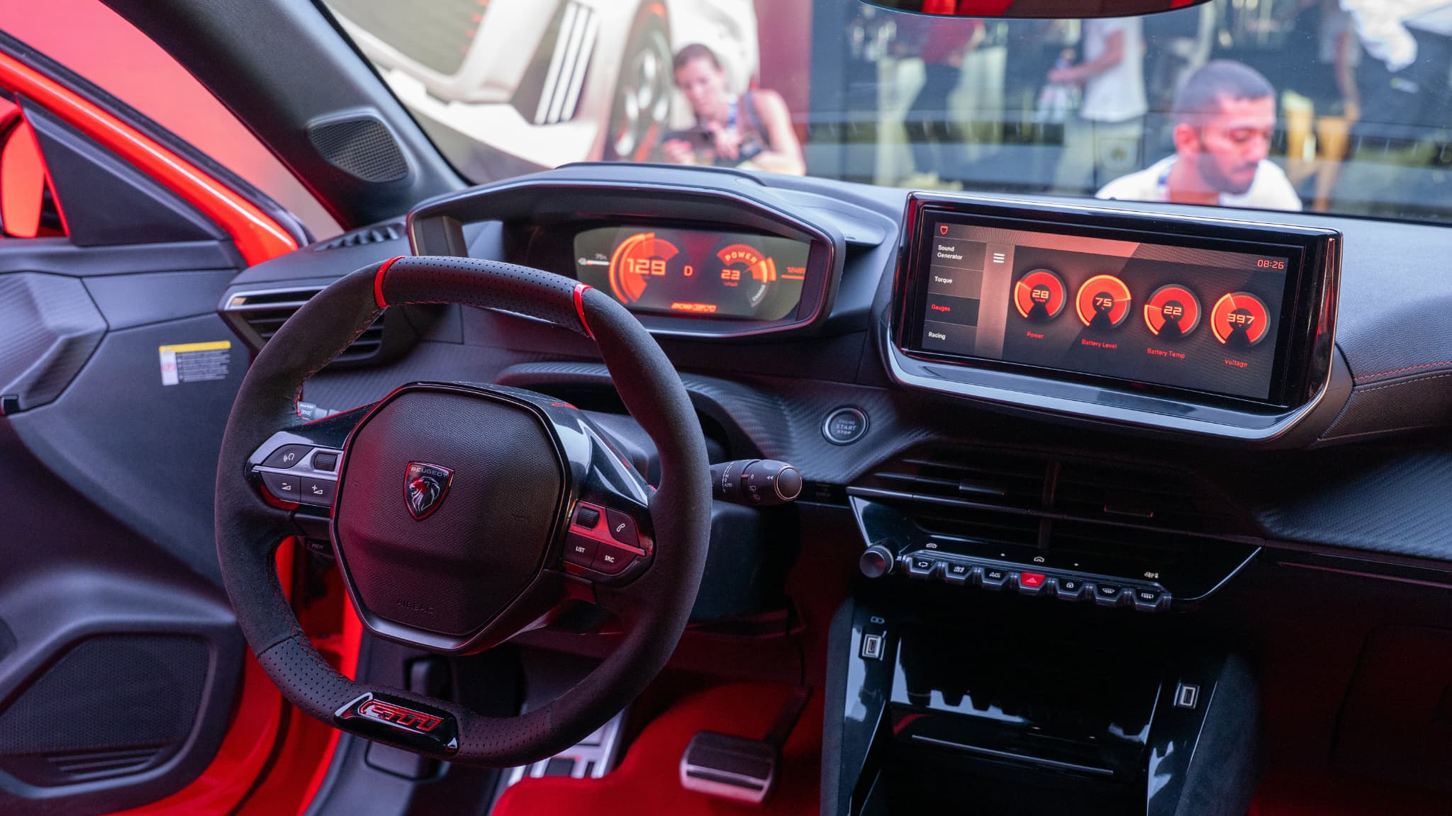 Inside the new Peugeot e-208 GTi.