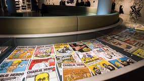 Des numéros de Charlie Hebdo, exposés au salon de la bande dessinée d'Angoulême, le 28 janvier 2015.