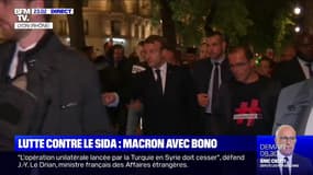 Lutte contre le Sida: Emmanuel Macron et Gérard Collomb déambulent à Lyon aux côtés du chanteur Bono