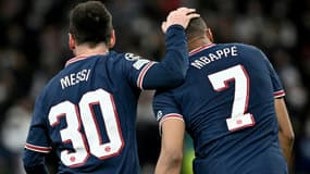 Les attaquants du PSG Lionel Messi et Kylian Mbappé pendant le 8e de finale retour de Ligue des champions contre le Real Madrid, le 9 mars 2022 au Stade Santiago Bernabeu