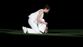 Rikako Ikee a porté la flamme dans le stade olympique en catamini jeudi