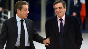 Nicolas Sarkozy et François Fillon au siège de l'UMP mardi 2 décembre 