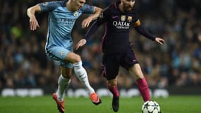 John Stones et Lionel Messi