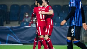 Mohamed Salah enlace Diogo Jota, l'autre grand bonhomme de ce match