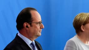 François Hollande, Angela Merkel et Matteo Renzi lors d'une conférence de presse à Berlin, le 27 juin 2016. 