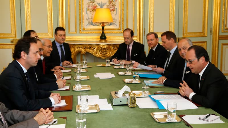 François Hollande face au chef de la coalition nationale syrienne, le 5 mars 2015, à l'Elysée. 
