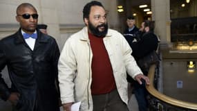 Dieudonné à son arrivée au Palais de justice de Paris le 12 mars 2015.