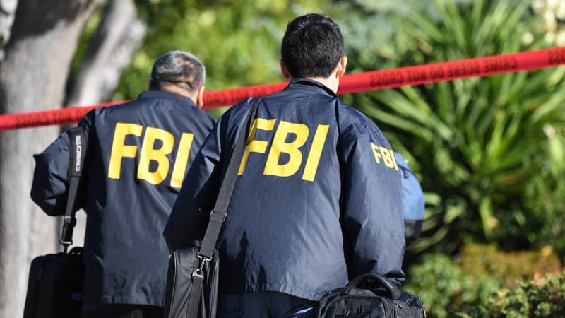 Des agents du FBI sur une scène de crime. (IMAGE D'ILLUSTRATION)